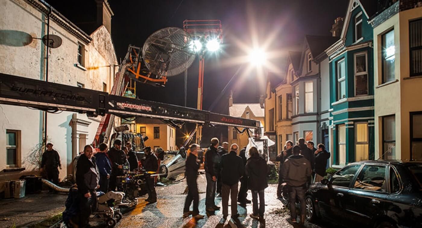 10 Shooting Schedule Pro Tips to Build Momentum on Set - 10 - Night Scene Film Crew - StudioBinder